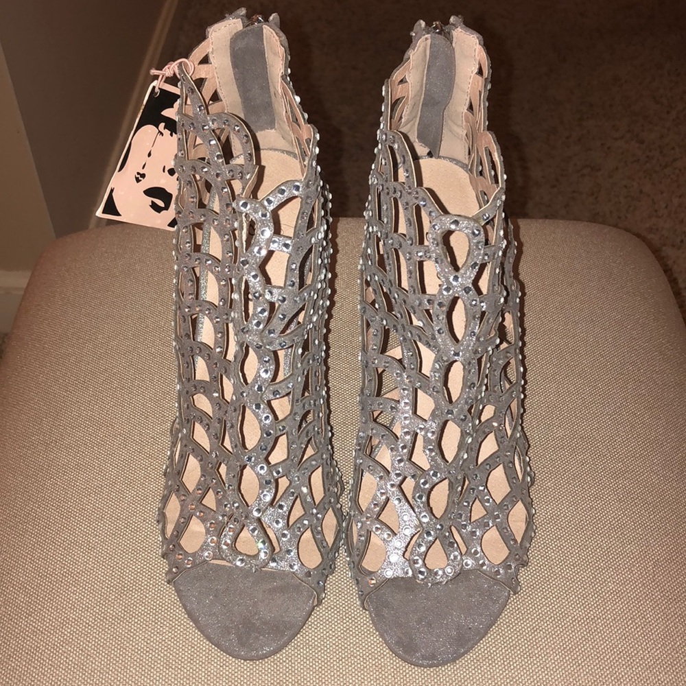 Never worn, with tags... ZigiSoho booties Size 8